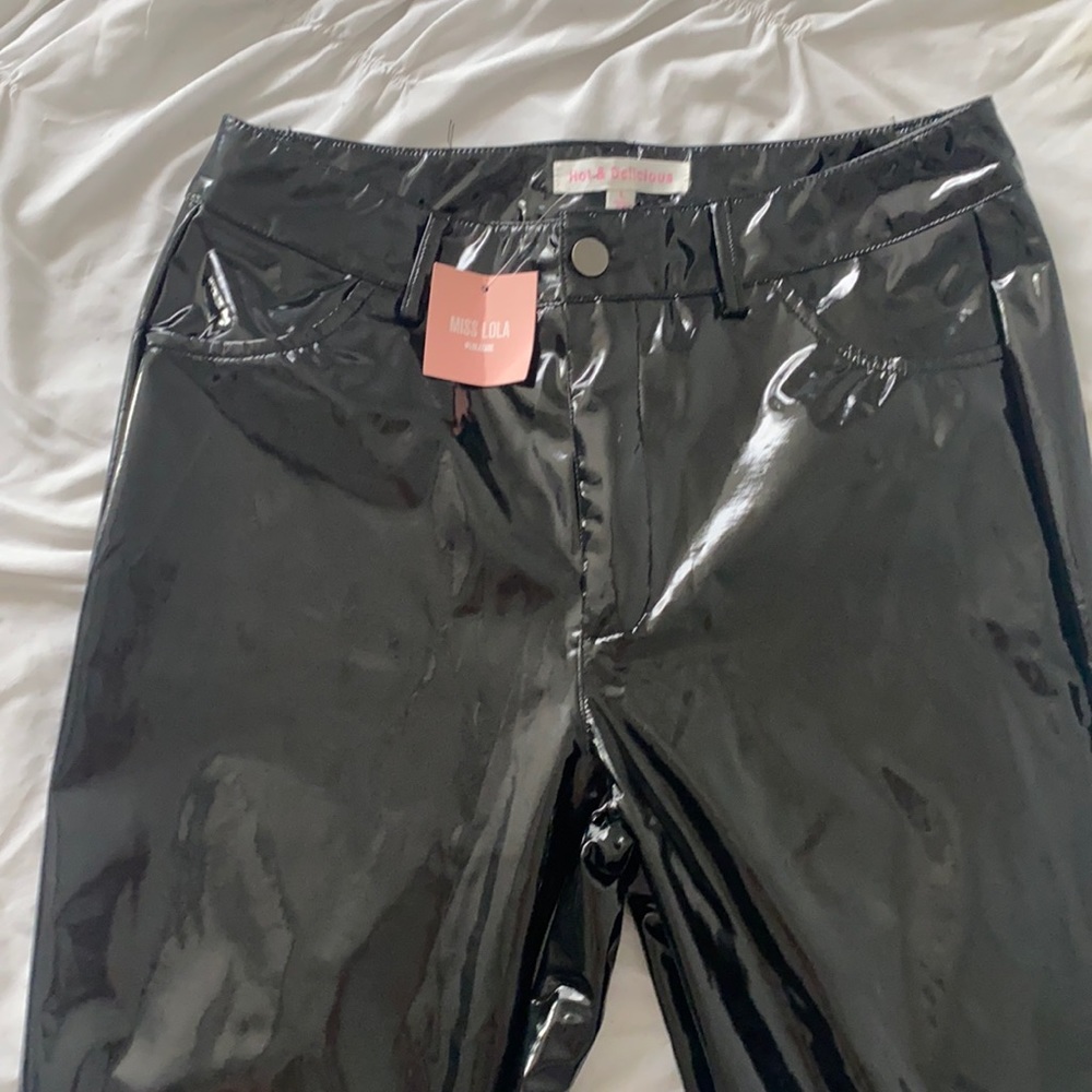Black leather pants never worn Miss Lola boutique